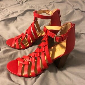 Red women’s XOXO brand strappy 3 inch zip heels size 7.5. Worn once EUC